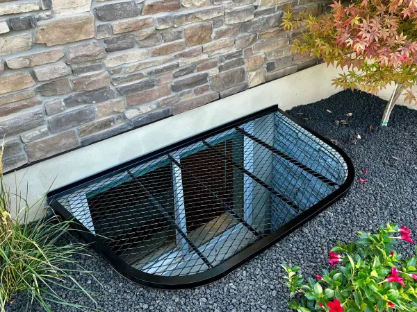 Black steel window well cover